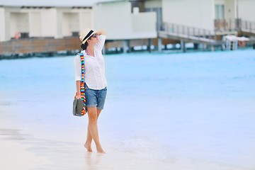 Image showing beautiful gril on beach have fun