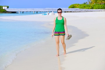 Image showing beautiful gril on beach have fun