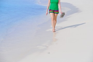 Image showing beautiful gril on beach have fun