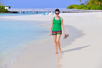 Image showing beautiful gril on beach have fun