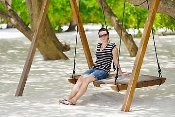 Image showing beautiful gril on beach have fun