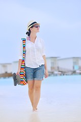 Image showing beautiful gril on beach have fun