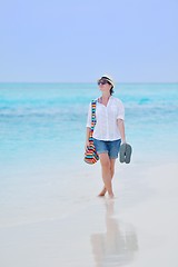 Image showing beautiful gril on beach have fun