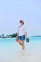 Image showing beautiful gril on beach have fun