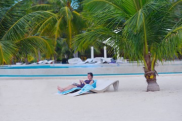 Image showing beautiful gril on beach have fun