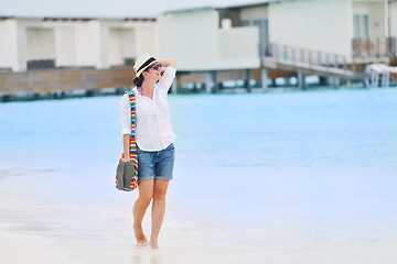 Image showing beautiful gril on beach have fun