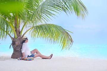 Image showing beautiful gril on beach have fun