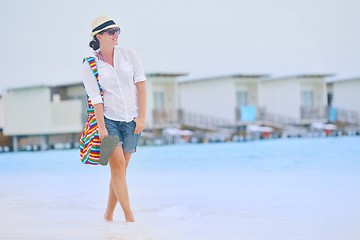 Image showing beautiful gril on beach have fun