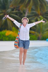 Image showing beautiful gril on beach have fun