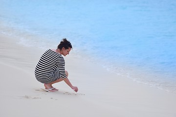 Image showing beautiful gril on beach have fun