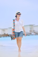 Image showing beautiful gril on beach have fun