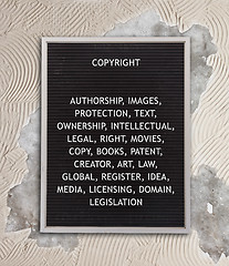 Image showing Copyright concept in plastic letters on very old menu board