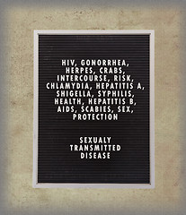 Image showing STD concept in plastic letters on very old menu board