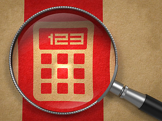 Image showing Magnifying Glass with Icon of Calculator.