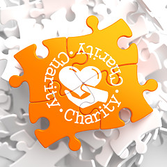 Image showing Charity Concept on Orange Puzzle.