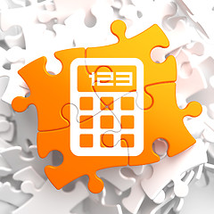 Image showing Calculator Icon on Orange Puzzle.