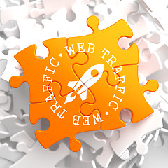 Image showing Web Traffic Concept on Orange Puzzle.