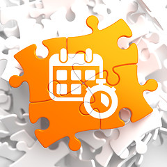 Image showing Calendar with Timer Icon on Orange Puzzle.