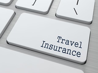 Image showing White Keyboard with Travel Insurance Button.