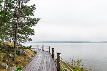 Image showing Wooden path on a lakeshore