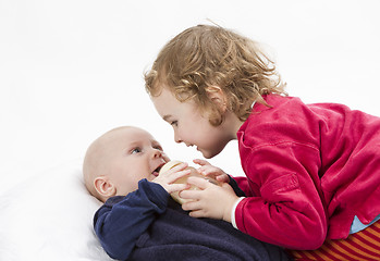 Image showing baby boy with older sister