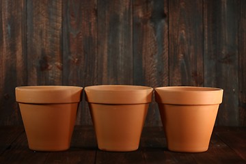 Image showing Empty Clay Flower Pots Background