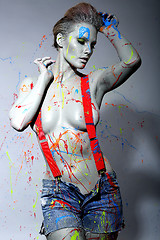 Image showing Female House Painter Splattered with Latex Paint