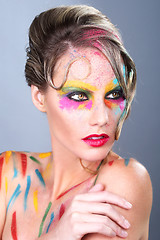 Image showing Woman With Extreme Makeup Design With Colorful Powder