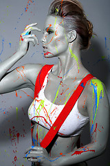 Image showing Female House Painter Splattered with Latex Paint