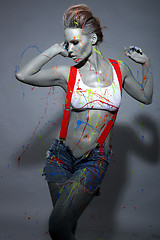 Image showing Female House Painter Splattered with Latex Paint