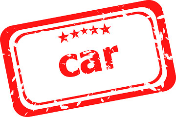 Image showing car on red rubber stamp over a white background