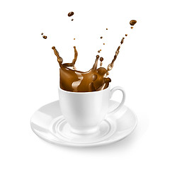 Image showing Splash of coffee in the cup isolated on white