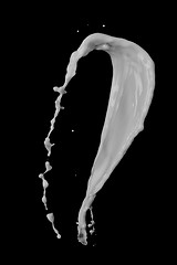 Image showing milk splash isolated on black background