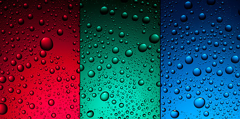 Image showing water drops on red, green and blue backgrounds