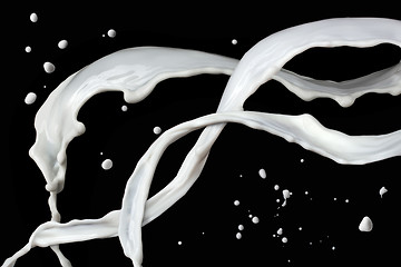 Image showing milk splash isolated on black background