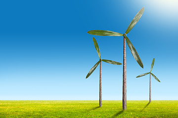 Image showing Green energy concept - natural wind generator turbines on summer