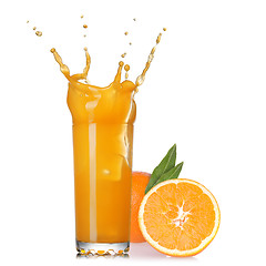 Image showing splash of juice in the glass with orange isolated on white