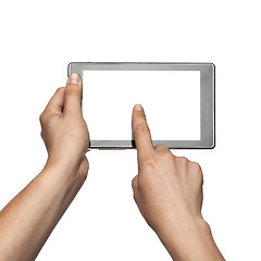 Image showing Hand holding Tablet PC isolated on white