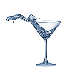 Image showing Martini splash in glass isolated on white