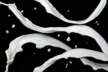 Image showing milk splash isolated on black background