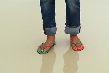 Image showing Feet in wet sand