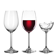 Image showing empty, full of wine and broken wineglasses isolated on white