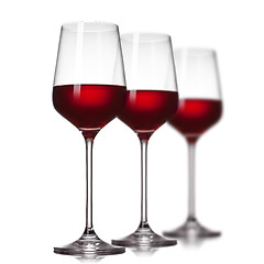 Image showing Red wine in glasses isolated on white