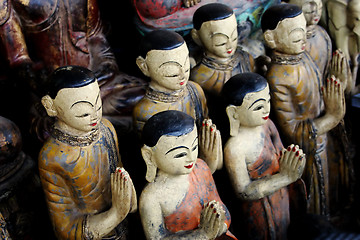 Image showing Wooden Buddhist statues