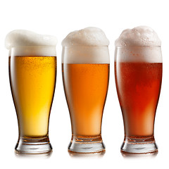 Image showing Different beer in glasses isolated on white background