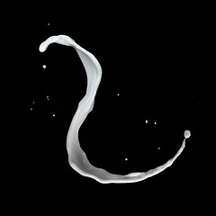 Image showing milk splash isolated on black background