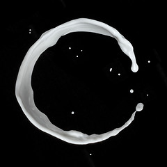 Image showing milk splash isolated on black background