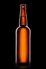 Image showing Beer bottle isolated on black