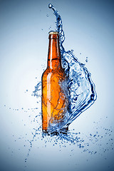 Image showing Beer bottle with water splash