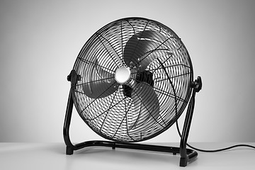 Image showing black  modern electric fan on white